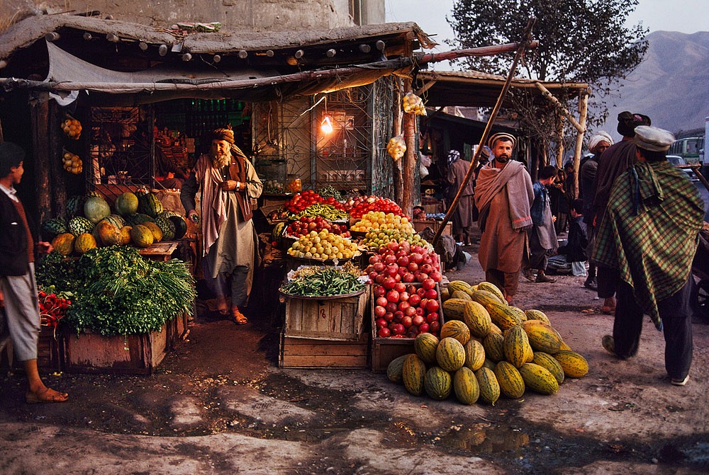 Steve McCurry, Harvest Market, 1992
FujiFlex Crystal Archive Print, (Inquire for available sizes)
AFGHN-12348